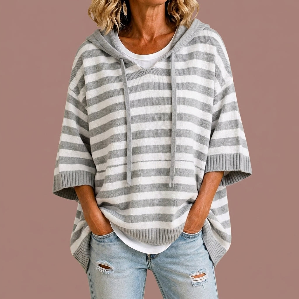 Loredana | Poncho in maglia a righe con cappuccio