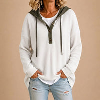 Tiziana | Poncho in maglia con cappuccio e bottoni